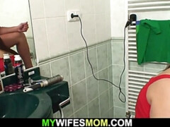 Huge boobs mother-in-law pleases him in the bathroom