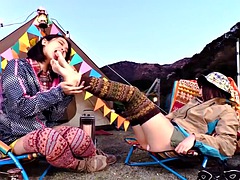 Two charming girls in a camping