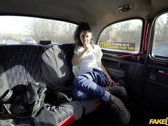 A petite Spanish chick and a taxi driver get it on in the back seat.