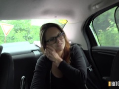 A nerd with nice fake boobs