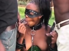 Sexy African sista enjoying a submissive double blowjob