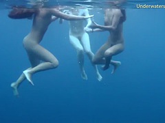 Hot erotica in the sea with 3 girls