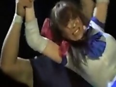 She wrestles a masked man and loses, then gets stripped on