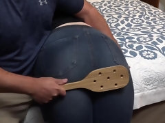 Paddle for a round brunette butt and punishment