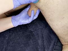 Prostate massage with gloves and giant dildo