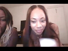 Light skin and dark ebony chicks dancing naked