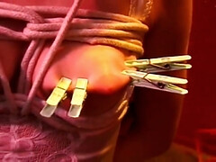 Hottie with a decent rack getting ready for a BDSM session