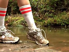 Caroline New Balance sneaker hike with mud and water preview