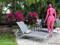 Passionate beauty explores sensual latex foot pleasures