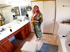 The blonde woman is on her knees and ready to suck