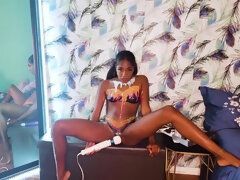 Amari Anne massages her cocoa pussy with vibrator