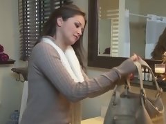 Long haired brunette has sex in front of a fireplace