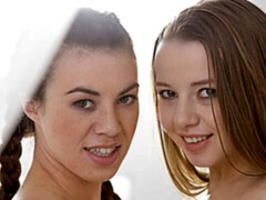 Gorgeous babes Olivia Grace and Tiffany Doll are fucking on the bed