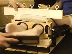 Japanese girl tickled in stocks