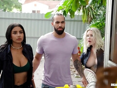 Tattooed blonde dude fucks two horny sluts in a van