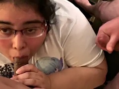 Hairy BBW sucks cocks and gets sprayed with cum