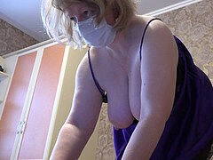 A golden showers in front of a webcam in Skype, a busty mummy with a hairy pussy peeing and showing panties. Fetish.